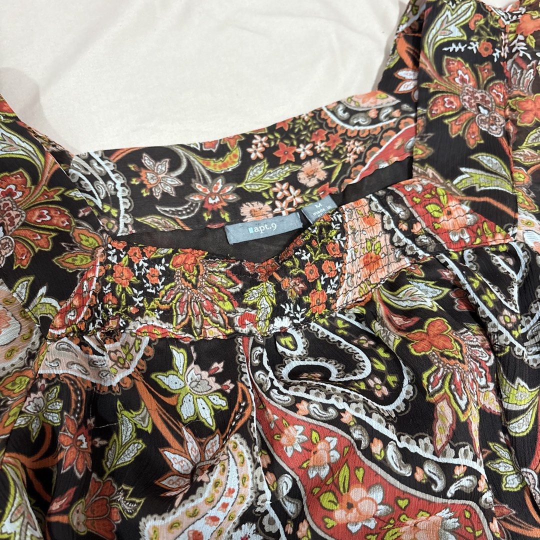 Apt. 9 Paisley Floral Square Neck Blouse Medium (Category: Blouses) located in Tuguegarao City. Submitted by shopaholiccccs (Listing ID 1469625012, Image 3). Description: - Brand: Apt. 9 - Size: Medium - Pattern: Intricate paisley and floral on black - Details: Square neckline, smocked elastic chest, flutter sleeves - Features: Lightweight chiffon fabric and adjustable side drawstrings.