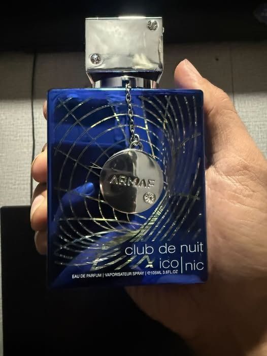 Armaf CDN Iconic EPD (Category: Fragrance & Deodorants) located in Bulacan. Submitted by koyeneke (Listing ID 1469636390, Image 1). Description: Armaf Club de Nuit Iconic eau de parfum. Blue bottle with a metal chain and charm hanging from the cap. 105ml size, 3.6 fluid ounces. Vaporisateur spray bottle. Full bottle shown in hand..
