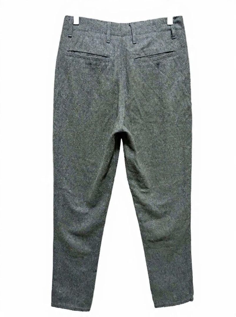 Armani Jeans Grey Wool Blend Trousers Size S (Category: Trousers) located in Quezon City. Submitted by kimzxc_536 (Listing ID 1469692589, Image 2). Description: - Brand: Armani Jeans - Size: S (Fits waist 30) - Material: 80% Wool, 20% Polyester (warm & cozy for colder days) - Color: Grey - Details: Classic tailored cut, two back pockets, signature small red AJ embroidery near the front pocket - Origin: Made in China - Condition: Clean overall.
