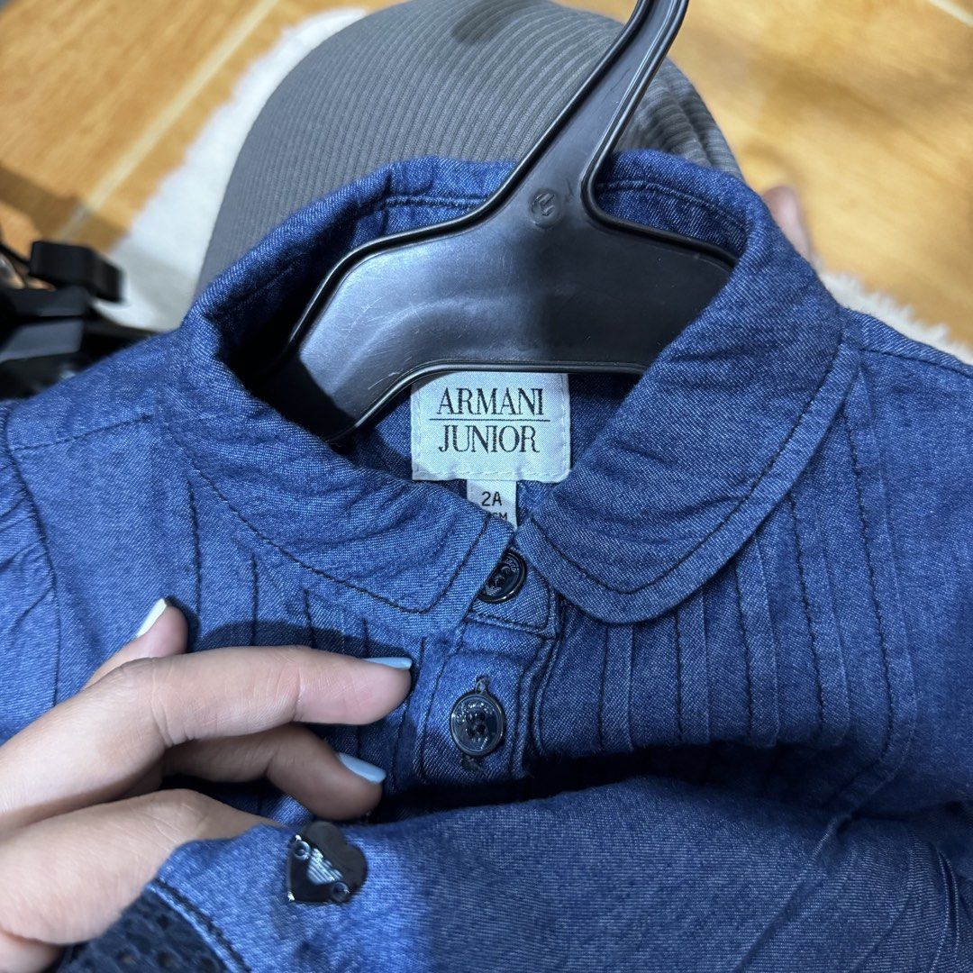 ARMANI JUNIOR soft-denim polo blouse (Category: Babies & Kids Fashion) located in Valenzuela. Submitted by thriftynanay88 (Listing ID 1469630666, Image 2). Description: Size 2Y on tag.