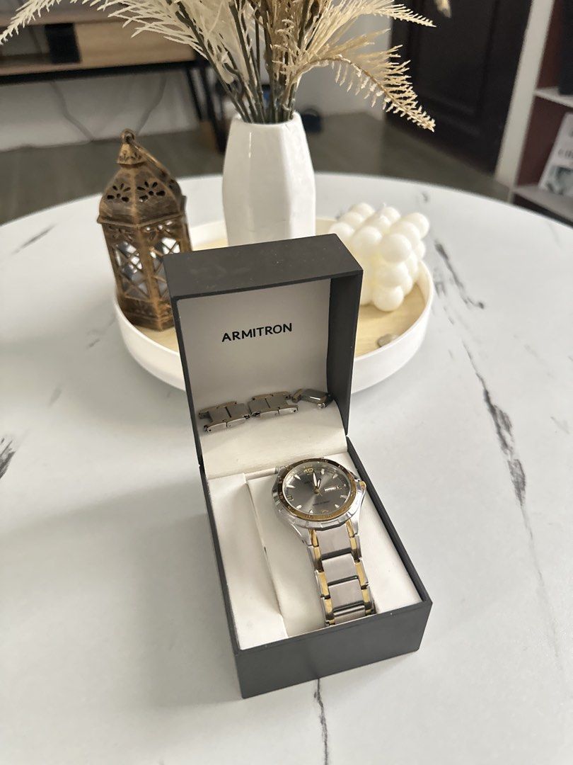 Armitron Two-Tone Watch with Box and Extra Links (Category: Women's Watches) located in Taguig. Submitted by elle_white (Listing ID 1469614144, Image 2). Description: Up to 7.5 inches wrist size - w/ 5 extra links No issues. With hairline scratches but not noticeable.