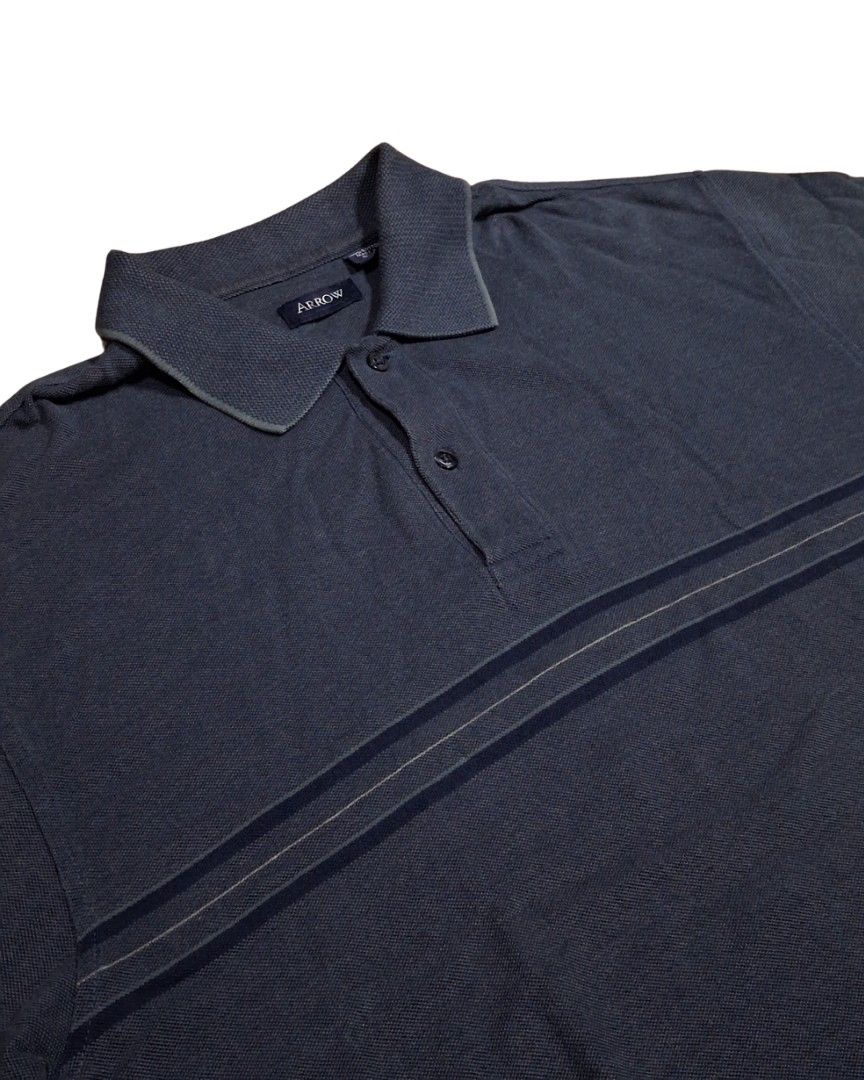 Arrow Polo Shirt (Dark gray) (Category: Tshirts & Polo Shirts ) located in General Mariano Alvarez. Submitted by klasiko.19 (Listing ID 1469690716, Image 2). Description: Arrow Polo Shirt (Dark gray) • Condition: Excellent 9/10 - Minimal signs of wear, very good overall condition. • Material: 100% Cotton • Size: M (Tag), Can fit up to Large • Pit-to-pit: 22" • Length: 29".