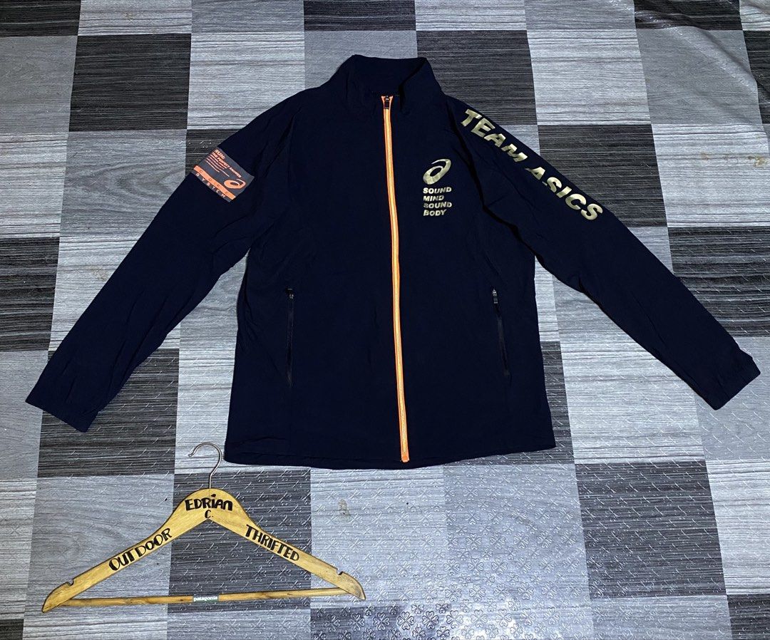 Asics - Running Jacket / nylon (Category: Coats, Jackets and Outerwear) located in General Santos City (Dadiangas). Submitted by castilloed98 (Listing ID 1469630465, Image 1). Description: Asics - Running Jacket (Team Asics) Nylon Size.M Dimes.21x27 Stretchable Good Asnew 💵700 + SF✈️ DM📩 📍Gensan..