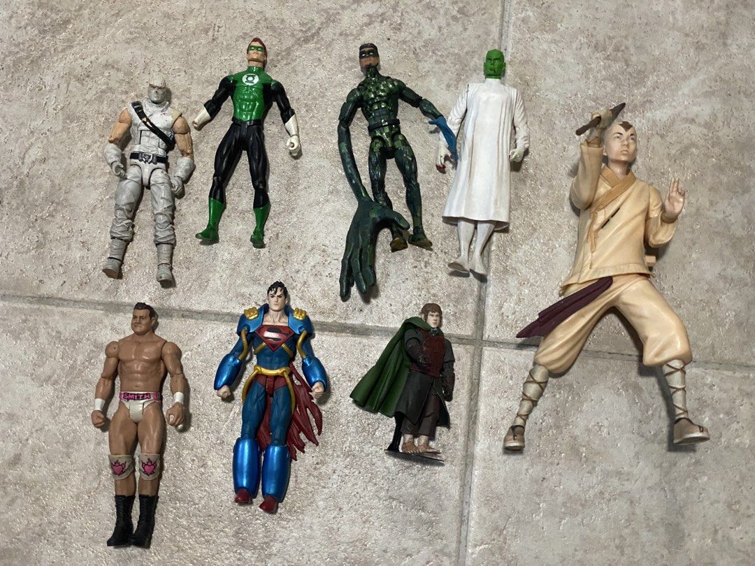 Assorted Action Figures Lot DC Marvel Lord of the Rings (Category: Figurines & Statues) located in Cebu City. Submitted by bred_bt (Listing ID 1469702425, Image 1). Description: - Lot of 8 action figures from popular franchises - Includes Green Lantern (issue: missing hand), Superboy Prime, Aang (Avatar), Lord of the Rings, and wrestling figures - Features various sizes and dynamic poses - Shows some minor wear from play and storage - Ideal set f
