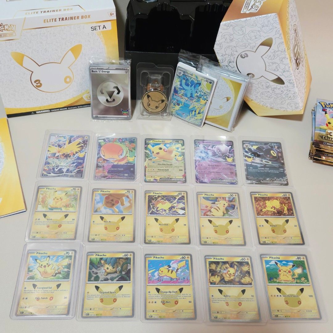Assorted characters (Category: Raw Singles) located in Pasig City. Submitted by kshopph (Listing ID 1469630238, Image 3). Description: OPENED 30TH ANNIVERSARY ETB SET A Inclusions: Sealed Promo Card Nidorina Sleeves Dice and Coin Basic Energy Set Players Guide 2 IR - Zapdos and Scraggy (with sleeves and toploader 3 EX - Pikachu, Mewtwo and Umbreon(with sleeves and toploader) 10pcs - Pikachu (with sleeves and toploader) Empty booster packs .
