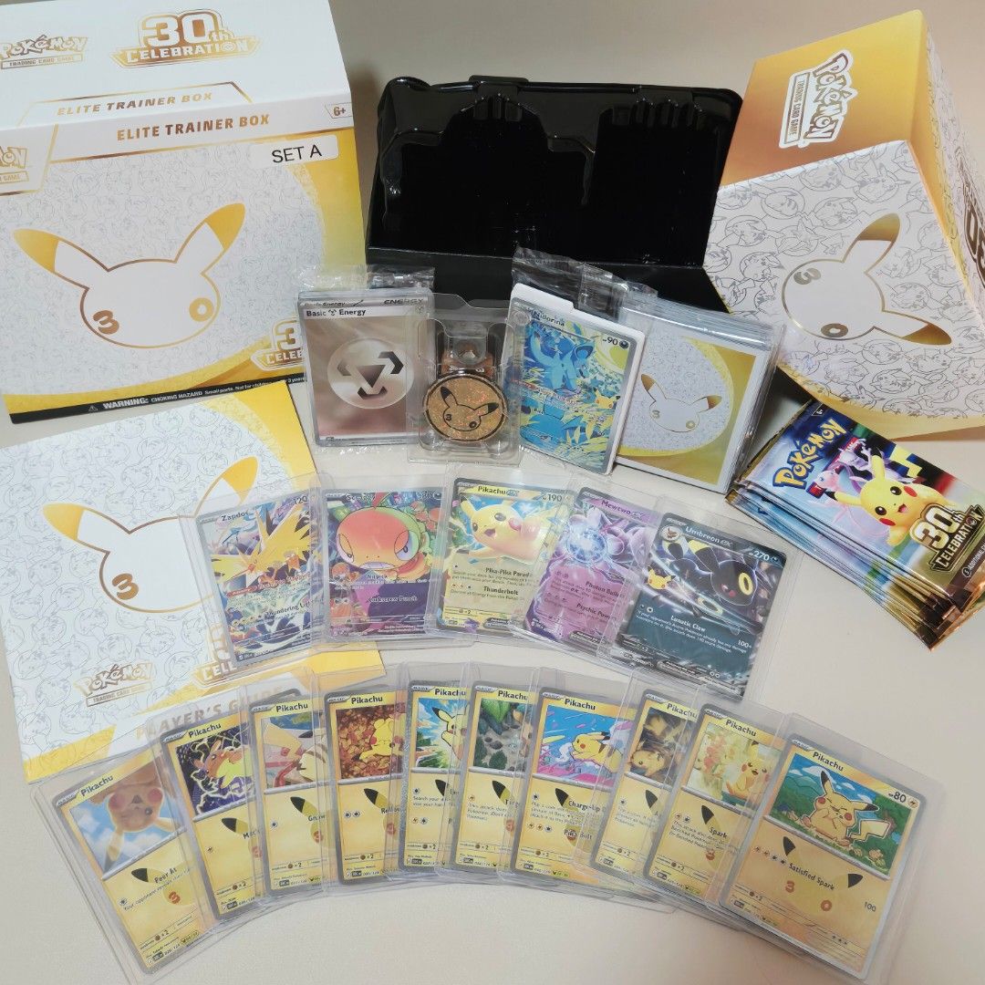 Assorted characters (Category: Raw Singles) located in Pasig City. Submitted by kshopph (Listing ID 1469630238, Image 2). Description: OPENED 30TH ANNIVERSARY ETB SET A Inclusions: Sealed Promo Card Nidorina Sleeves Dice and Coin Basic Energy Set Players Guide 2 IR - Zapdos and Scraggy (with sleeves and toploader 3 EX - Pikachu, Mewtwo and Umbreon(with sleeves and toploader) 10pcs - Pikachu (with sleeves and toploader) Empty booster packs .