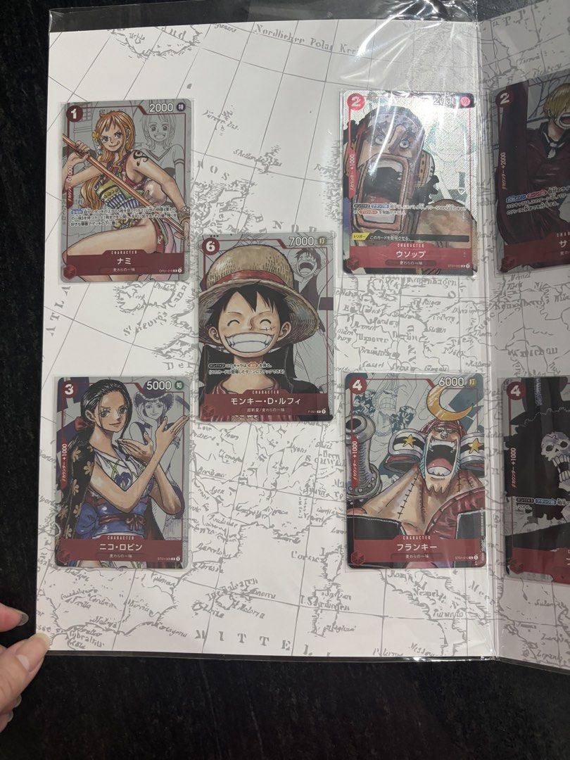 Assorted characters (Category: Raw Singles) located in Muntinlupa City. Submitted by bagaholicmom (Listing ID 1469601038, Image 3). Description: 💯 LEGIT! One piece 25th anniversary premium collection- Php 8,000 One piece live action edition premium card collection- Php 7,000 Sealed booklet Complete set Mop: bank transfer / gcash Available for pickup within MM Courier outside MM Mop: gcash bank transfer Own pickup arrangement within MM Courier se