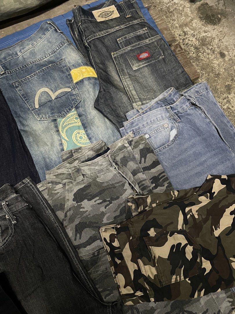 Assorted Designer and Streetwear Jeans Bundle (Category: Jeans) located in Manila. Submitted by chawmichael (Listing ID 1469601617, Image 2). Description: - Ultimate streetwear pants bundle featuring top hype and designer brands - Includes Chrome Hearts, True Religion, Louis Vuitton monogram, Evisu with back pocket prints, camo cargo pants, and washed denim - Variety of washes, fits, and unique designs in the pile - Perfect for upgrading your str