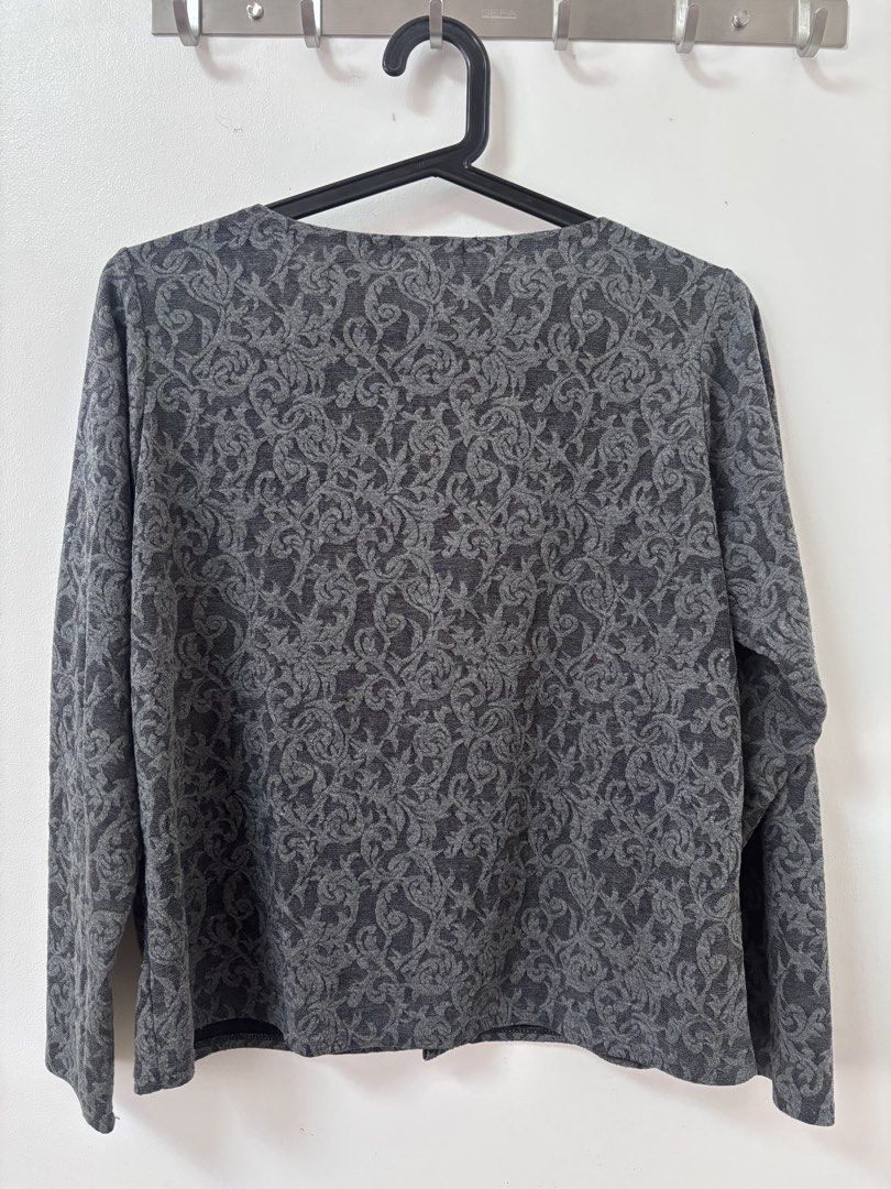 PRE-LOVED: Attractions Grey Patterned Long Sleeve Cardigan (Category: Longsleeves) located in Imus. Submitted by jertitay (Listing ID 1469633391, Image 2). Description: RFS: decluttering Grey long sleeve cardigan by Attractions. Intricate damask or floral pattern covering the whole garment. Open front style with a V-neckline. Fabric has a textured weave. Dark inner lining visible at the collar. Comfortable everyday layering piece, easy to throw o