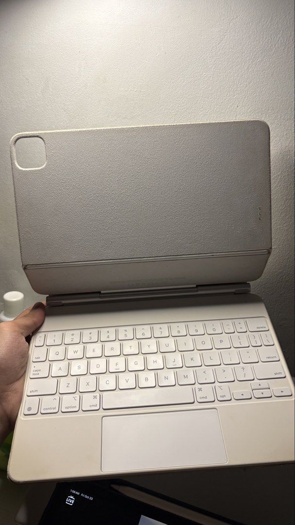 Authentic Apple Magic Keyboard for iPad Pro 11-inch (Category: Computer Keyboard) located in Taytay. Submitted by darrylejim (Listing ID 1469733888, Image 1). Description: - Authentic Apple Magic Keyboard for iPad in White - Features a responsive typing keyboard and built-in trackpad - Sleek floating cantilever design - Serial Number: T16QXGFQ5D (verified in settings) - Condition: Fully functional with normal signs of use on casing - Compatibilit