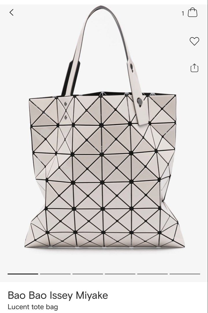 Authentic Bao Bao Issey Miyake Lucent Matte Tote Bag (Category: Tote Bags) located in Manila. Submitted by bagluxeph (Listing ID 1469710820, Image 2). Description: - Brand: Bao Bao Issey Miyake - Colors: Black and white available (sold individually or together) - Design: Iconic geometric triangular panels with a flexible structure - Features: Dual top handles with adjustable button closure - Inclusion: Comes with original dust bags and tags - Siz