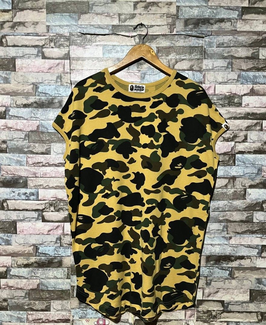 AUTHENTIC BAPE CAMO SLEEVELESS SHIRT (Category: Tshirts & Polo Shirts ) located in Caloocan City. Submitted by wewearworn (Listing ID 1469613187, Image 1). Description: Large Best Fit 23 x 32 Excellent No Issues 9.5/10 Color Rate.