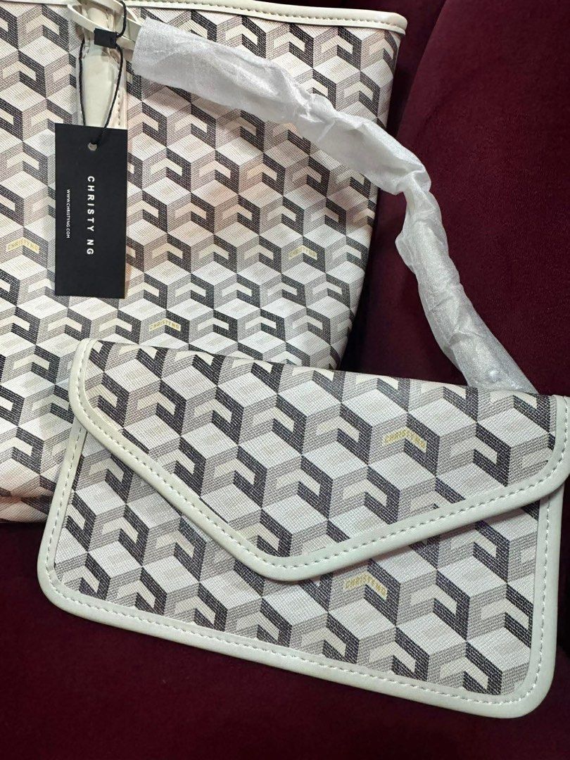 AUTHENTIC CHRISTY NG RUSSO LARGE MONOGRAM TOTE BAG 🌸 (Category: Tote Bags) located in Mandaluyong City. Submitted by simplyveaph (Listing ID 1469657248, Image 3). Description: AUTHENTIC CHRISTY NG RUSSO LARGE MONOGRAM TOTE BAG 🌸 Classic, chic, and versatile! The Christy Ng Russo Large Monogram Tote Bag in White is perfect for everyday use, shopping, travel, or work. Comes with a matching pouch for your essentials. Brand: Christy Ng Model: Russo
