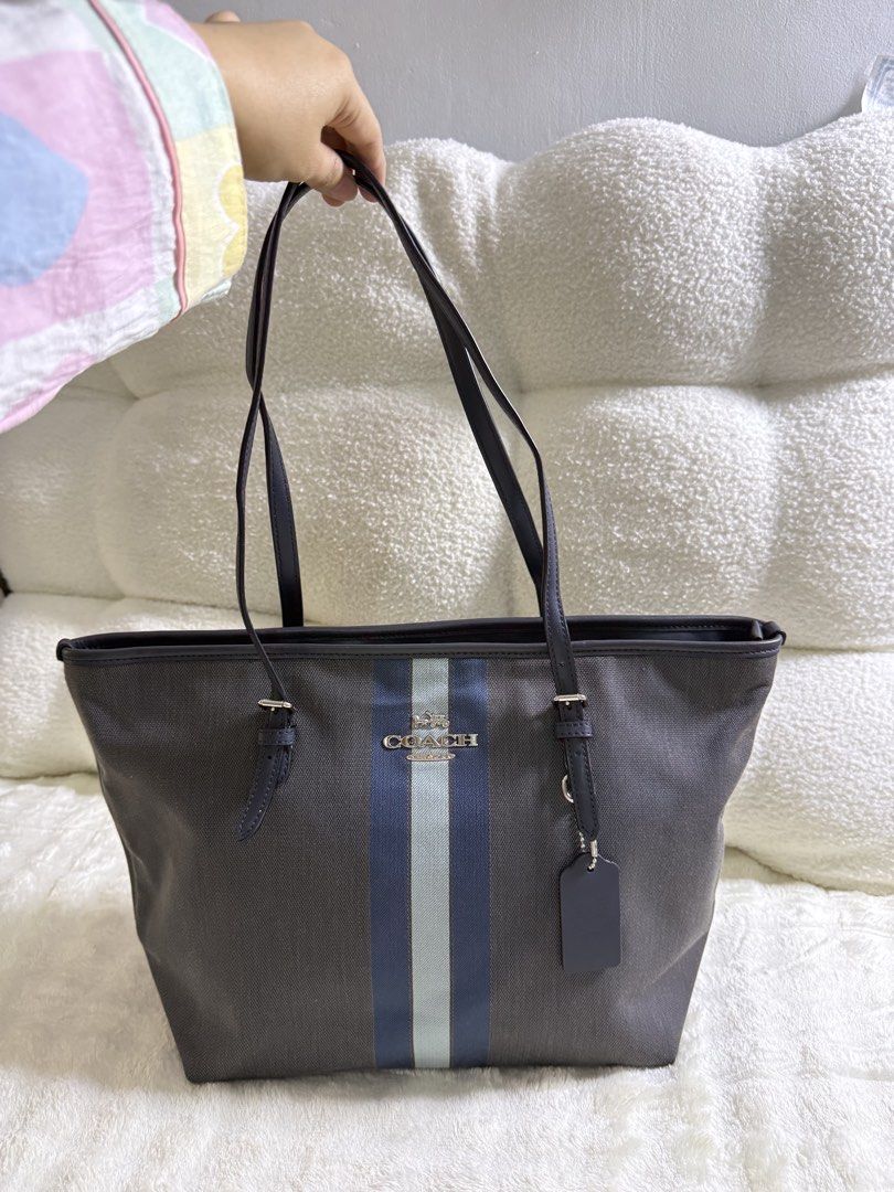 AUTHENTIC Coach Zip-Top Tote with Varsity Stripe (Category: Tote Bags) located in Tarlac. Submitted by mechaellat (Listing ID 1469706017, Image 1). Description: 100% Authentic, Money back guaranteed if proven fake. Condition: Used-Like New (no damage).