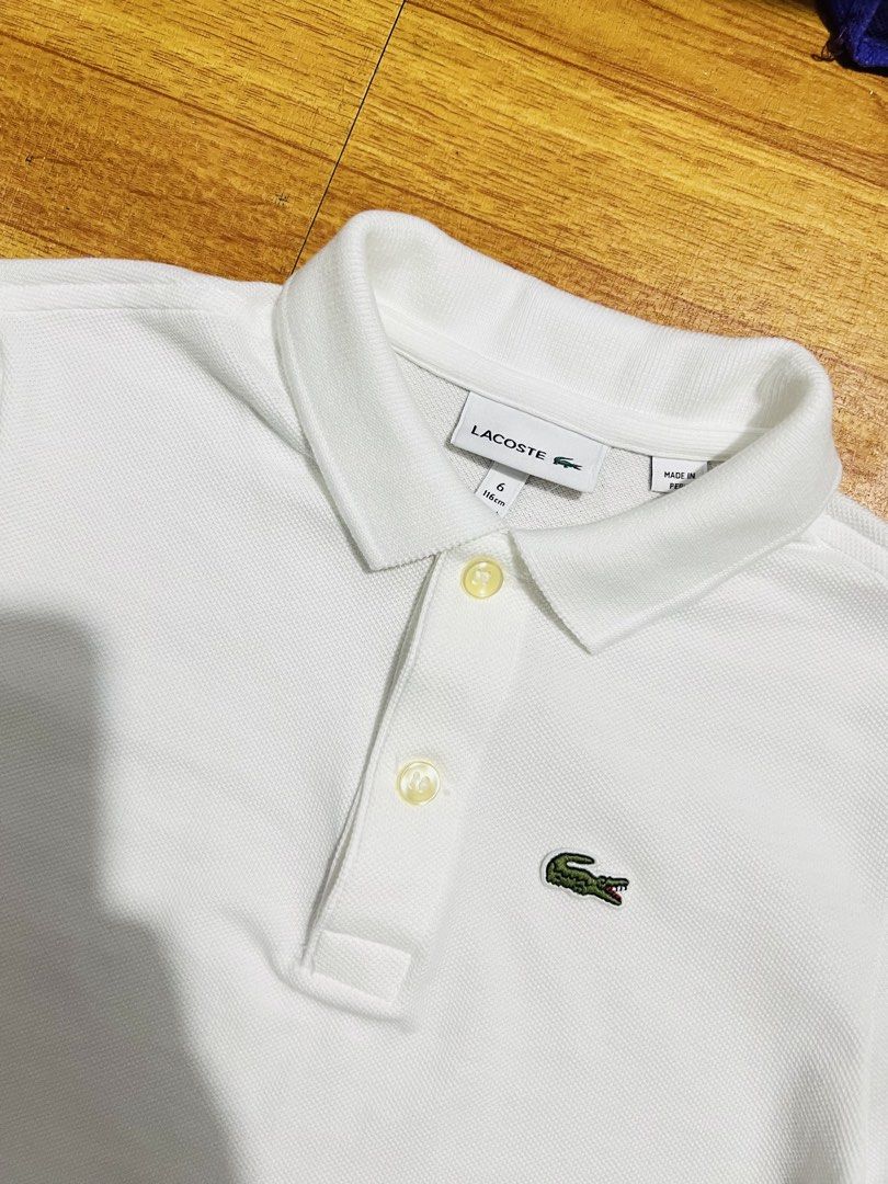 Authentic lacoste white polo shirt 6a (Category: Babies & Kids Fashion) located in Manila. Submitted by baeshop16 (Listing ID 1469694661, Image 2). Description: Good as new No issue 6a.