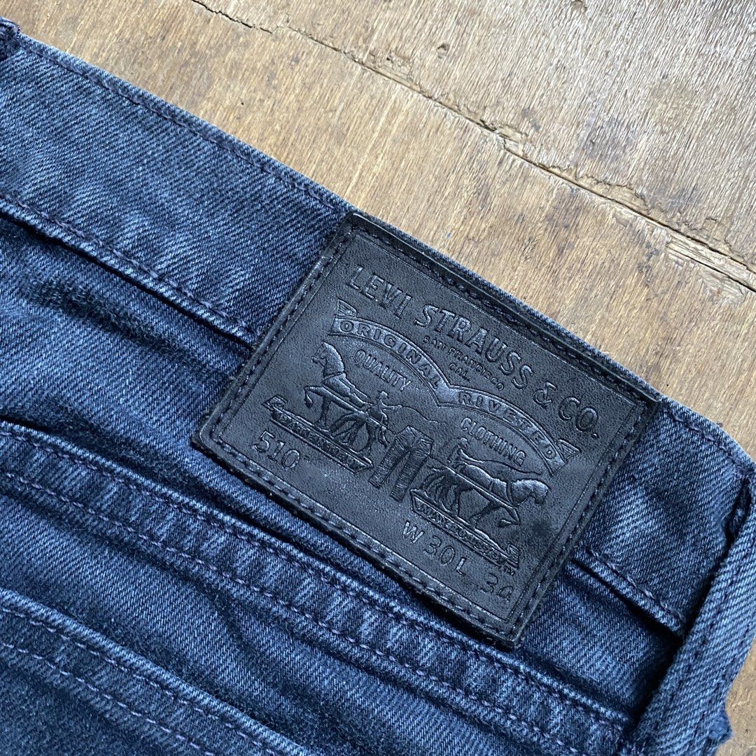 authentic Levi's 510 Jeans Dark Blue (Category: Jeans) located in Cagayan de Oro. Submitted by neoazai (Listing ID 1469581907, Image 3). Description: - Brand: Levi's 510 Skinny Fit Denim Jeans - Color: Dark Blue Wash with slight fading - Size: W30 L34 (based on leather patch) - Details: Classic five-pocket layout, button fly closure, branded brass zipper, and iconic red tab - Condition: Sturdy denim fabric in great shape.