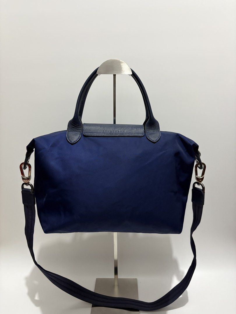 Authentic Longchamp Le Pliage Neo Small Short Handle (Category: Luxury Bags & Wallets) located in Subic. Submitted by dear.jeveaph (Listing ID 1469704589, Image 2). Description: Authentic Longchamp Le Pliage Neo Small Short Handle Needs wash Signs of use on bottom part See last photo for reference ₱ 1,500.00 READ BEFORE BUYING ‼️ All photos are posted. Please perform your own authentication beforehand. If in DOUBT, please do NOT buy. ‼️ Friendly 