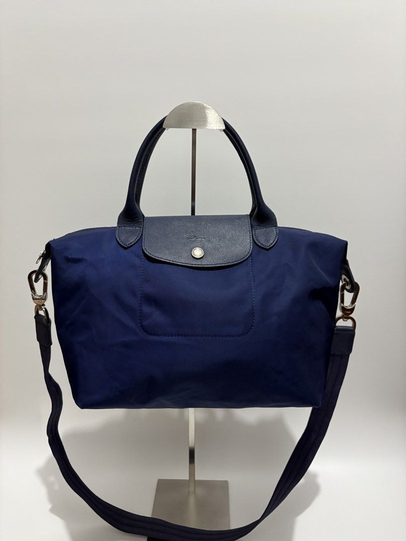 Authentic Longchamp Le Pliage Neo Small Short Handle (Category: Luxury Bags & Wallets) located in Subic. Submitted by dear.jeveaph (Listing ID 1469704589, Image 1). Description: Authentic Longchamp Le Pliage Neo Small Short Handle Needs wash Signs of use on bottom part See last photo for reference ₱ 1,500.00 READ BEFORE BUYING ‼️ All photos are posted. Please perform your own authentication beforehand. If in DOUBT, please do NOT buy. ‼️ Friendly 