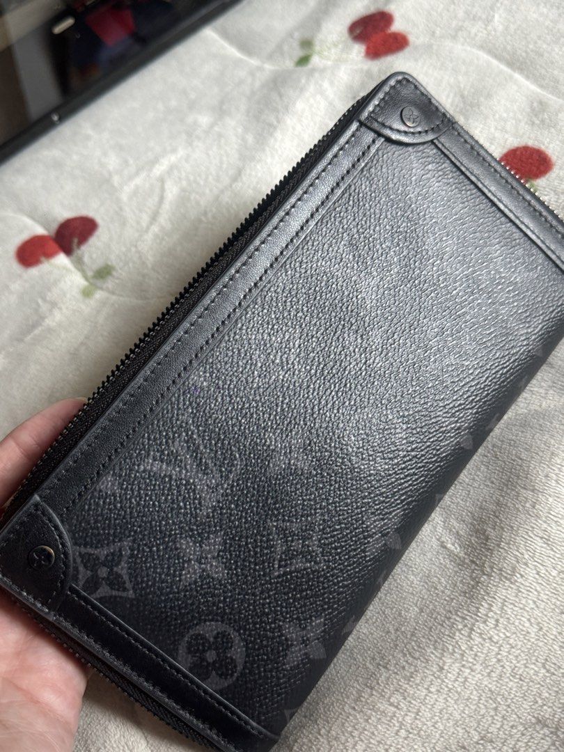 Authentic Louis Vuitton Monogram Eclipse Zippy Wallet (Category: Luxury Bags & Wallets) located in Manila. Submitted by ohashelee (Listing ID 1469591578, Image 1). Description: - Authentic Louis Vuitton Monogram Eclipse long zip-around wallet - Sleek black and grey colorway with matte hardware - Durable leather zipper pull with LV branding - Interior features matching monogram canvas, multiple card slots, and compartments for cash and receipts - 