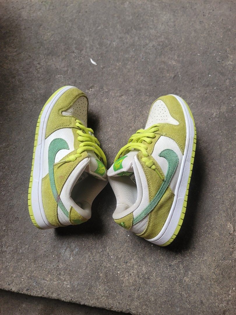 Authentic SB Dunk Low Apple Green Sneakers (Category: Sneakers) located in Iloilo. Submitted by remwil18 (Listing ID 1469745624, Image 2). Description: - Brand: Nike SB Dunk Low - Colorway: Apple Green / White with bright yellow-green laces - Materials: Leather base with suede overlays and Zoom Air insoles - Condition: Pre-owned with minor scuffs and dirt spots from normal wear - Soles: Still solid and plenty of life left.