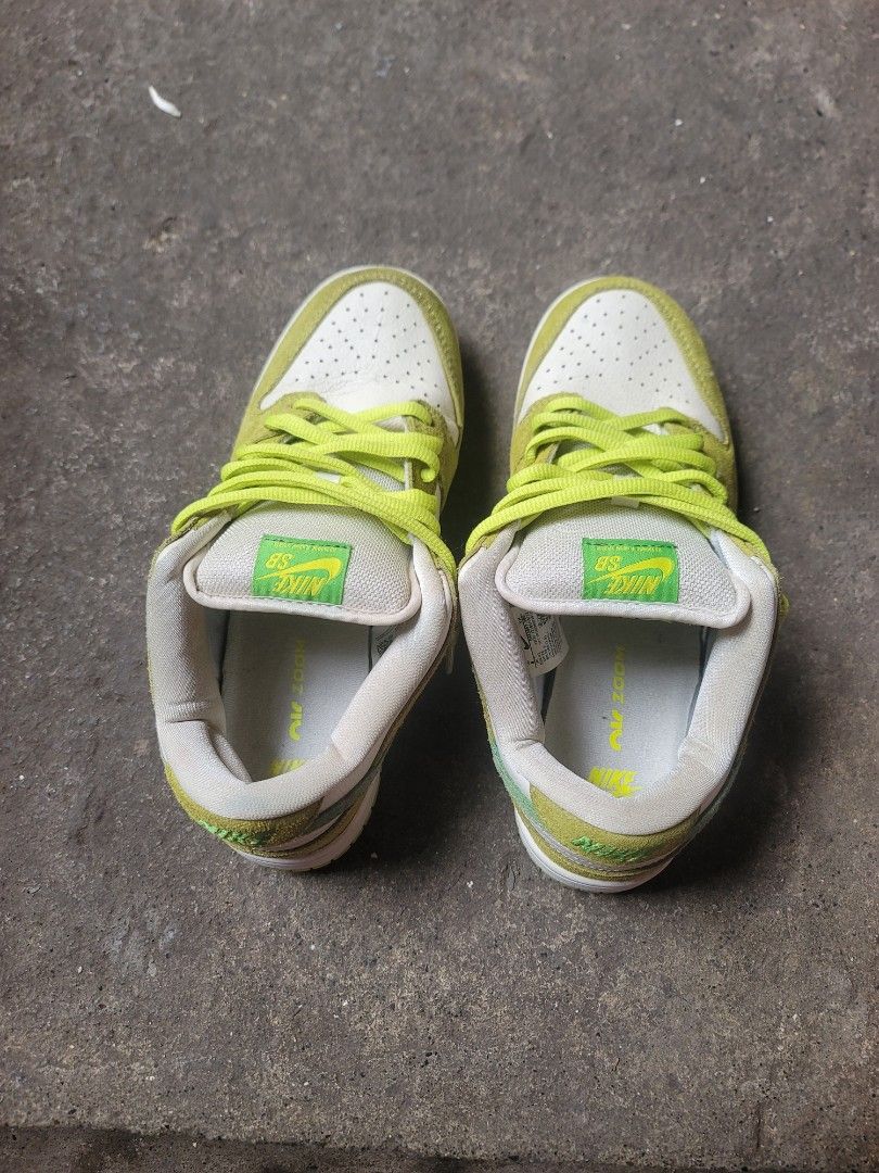 Authentic SB Dunk Low Apple Green Sneakers (Category: Sneakers) located in Iloilo. Submitted by remwil18 (Listing ID 1469745624, Image 3). Description: - Brand: Nike SB Dunk Low - Colorway: Apple Green / White with bright yellow-green laces - Materials: Leather base with suede overlays and Zoom Air insoles - Condition: Pre-owned with minor scuffs and dirt spots from normal wear - Soles: Still solid and plenty of life left.