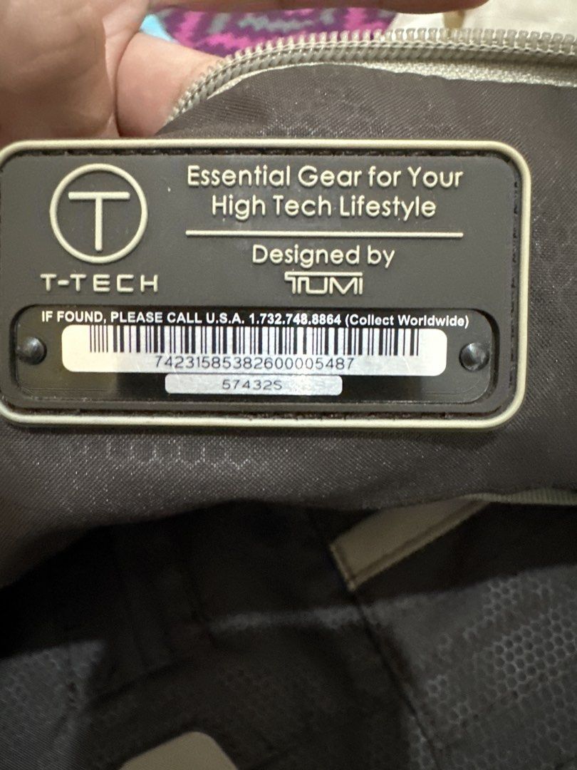 Authentic T-Tech by TUMI Crossbody / Sling Bag (Category: Sling Bags) located in Manila. Submitted by emily.santiago (Listing ID 1469634222, Image 2). Description: Brand: T-Tech by TUMI Model Code: 57432S Color: Khaki / Beige with Dark Brown Accents Material: Heavy-duty Ballistic Nylon / Polyester Features: Adjustable wide shoulder strap for maximum comfort Multiple zippered front & quick-access pockets Main compartment with dedicated organizer s