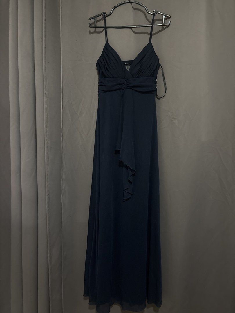 B. Smart Navy Blue Spaghetti Strap Maxi Dress (Category: Evening dresses & gowns) located in Cabuyao City. Submitted by airpz (Listing ID 1469669147, Image 1). Description: - Color: Smart navy blue - Style: Long dress with spaghetti straps, pleated bodice, and gathered waist - Details: Flowy skirt with a stylish draped front accent - Material: 100% polyester shell and lining (Made in Philippines).