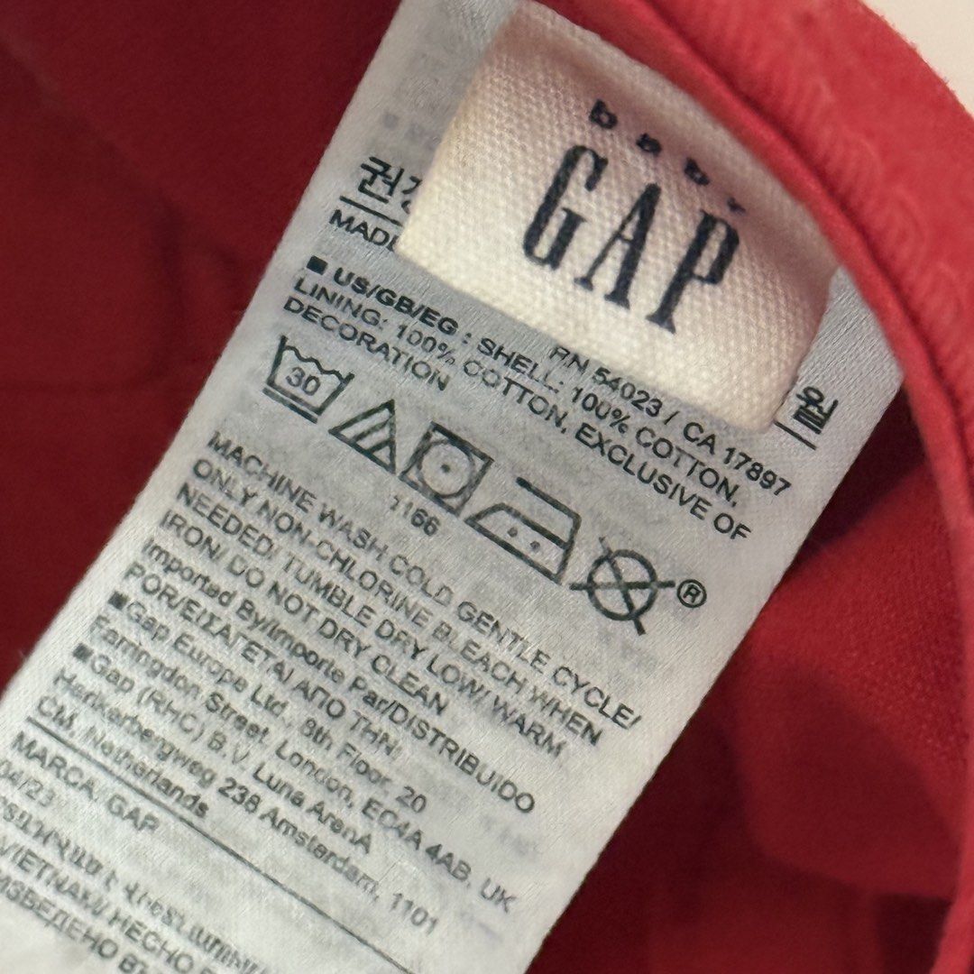 Baby Gap Red Logo Baseball Cap (Category: Babies & Kids Fashion) located in Marikina City. Submitted by lovegoeson (Listing ID 1469650104, Image 2). Description: - Brand: Baby Gap - Color: Bright red with navy blue and white embroidered GAP logo - Material: 100% cotton shell and lining - Fit: Elastic strap in the back for a comfortable fit - Care: Machine washable - Style: Classic casual hat for everyday wear.