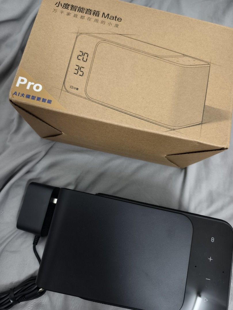 Baidu Xiaodu Smart Speaker Mate Pro (Category: Soundbars, Speakers & Amplifiers) located in Angeles City. Submitted by measaliman02351 (Listing ID 1469662532, Image 2). Description: - Model: Baidu Xiaodu Smart Speaker Mate Pro - Color: Sleek Black - Display: Built-in digital clock on front grille - Controls: Easy-to-use top panel buttons - Features: Advanced AI model integration support - Inclusions: Complete with power adapter and original box p