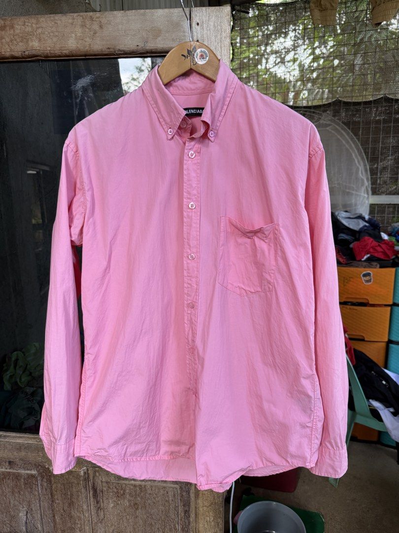 BALENCIAGA button down polo (Category: Formal Shirts) located in Manolo Fortich. Submitted by thriftacktoe34 (Listing ID 1469651143, Image 1). Description: Very good condition Color rate 9/10 Size XS Dimes W22 x L29 Issue: line fade sa may collar tas sa loob ng cuffs FREE shipping fee.