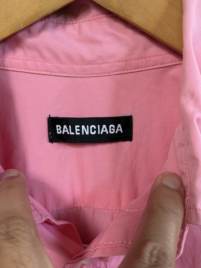 BALENCIAGA button down polo (Category: Formal Shirts) located in Manolo Fortich. Submitted by thriftacktoe34 (Listing ID 1469651143, Image 3). Description: Very good condition Color rate 9/10 Size XS Dimes W22 x L29 Issue: line fade sa may collar tas sa loob ng cuffs FREE shipping fee.