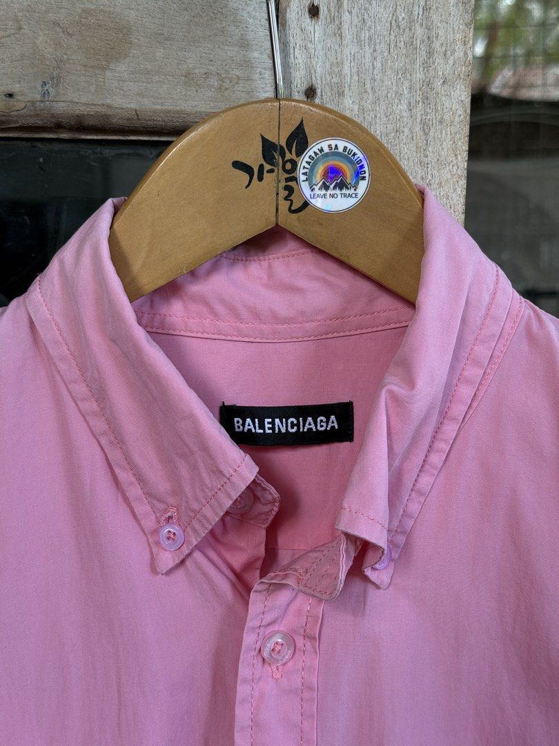 BALENCIAGA button down polo (Category: Formal Shirts) located in Manolo Fortich. Submitted by thriftacktoe34 (Listing ID 1469651143, Image 2). Description: Very good condition Color rate 9/10 Size XS Dimes W22 x L29 Issue: line fade sa may collar tas sa loob ng cuffs FREE shipping fee.