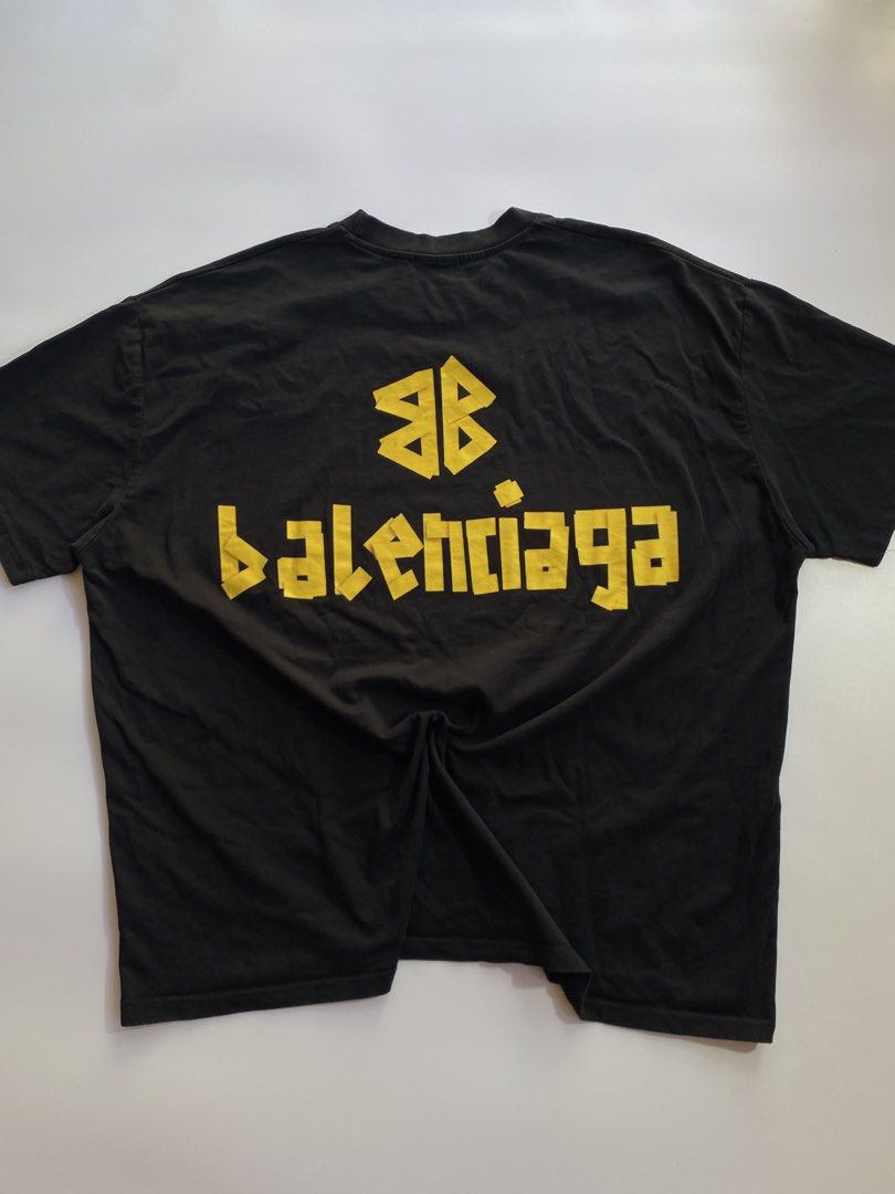 Balenciaga tape logo (Category: Tshirts & Polo Shirts ) located in Kalibo. Submitted by kurt_ismael (Listing ID 1469594316, Image 2). Description: Balenciaga tape logo Width: 30 Length: 32 Excellent condition Color rate: 10.