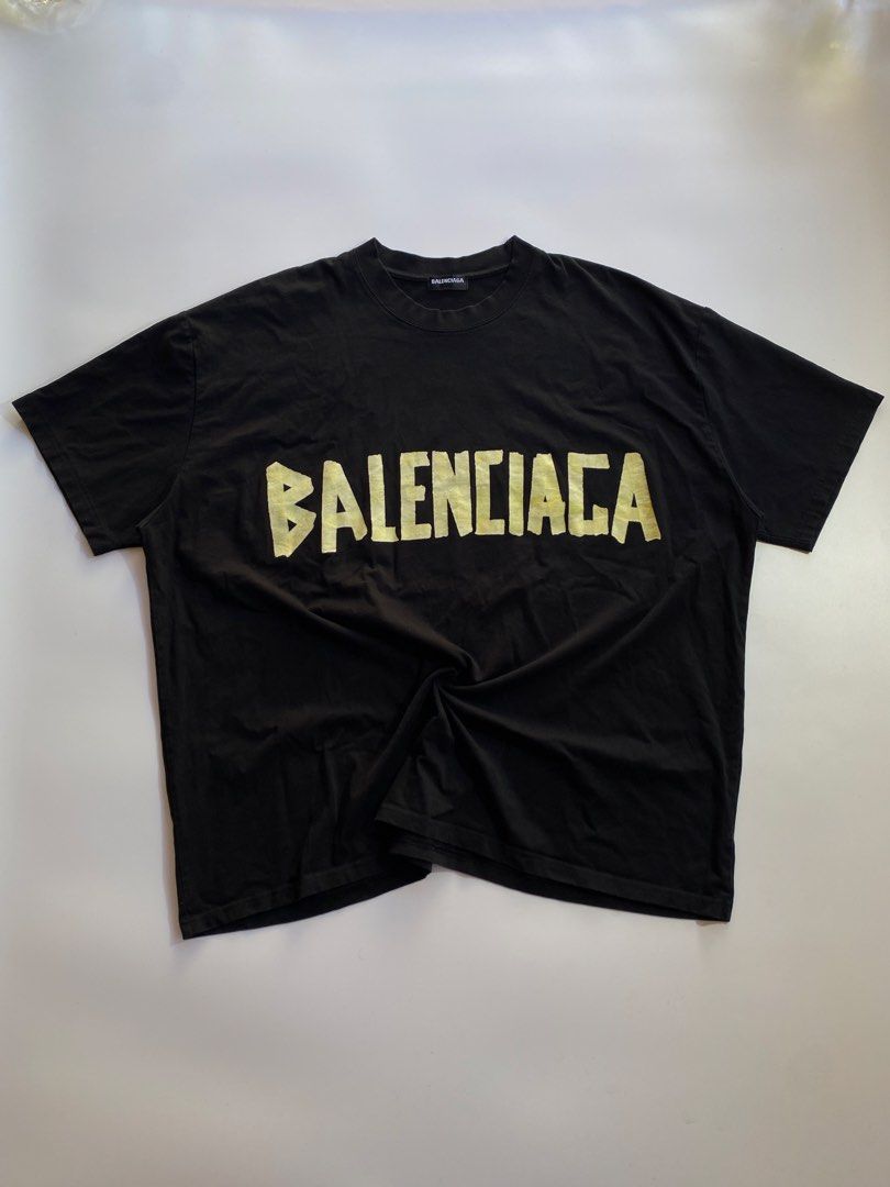 Balenciaga tape logo (Category: Tshirts & Polo Shirts ) located in Kalibo. Submitted by kurt_ismael (Listing ID 1469594316, Image 1). Description: Balenciaga tape logo Width: 30 Length: 32 Excellent condition Color rate: 10.