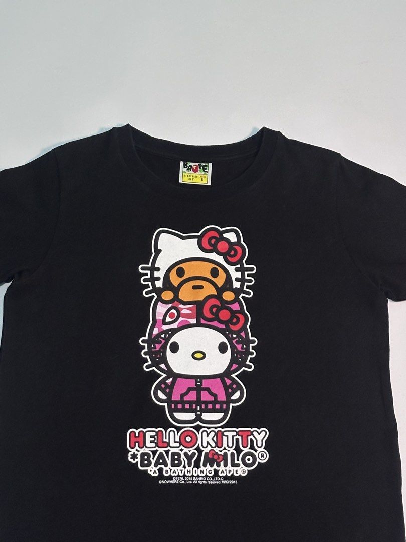 Bape Baby Milo X Sanrio Hello Kitty Tee (Category: Announcements) located in Cagayan de Oro. Submitted by _thriftcultureph (Listing ID 1469712426, Image 2). Description: Bape Baby Milo X Sanrio Hello Kitty Tee Guaranteed Authentic ( Money back If fake ) Size Small ladies Excellent Condition No flaws.
