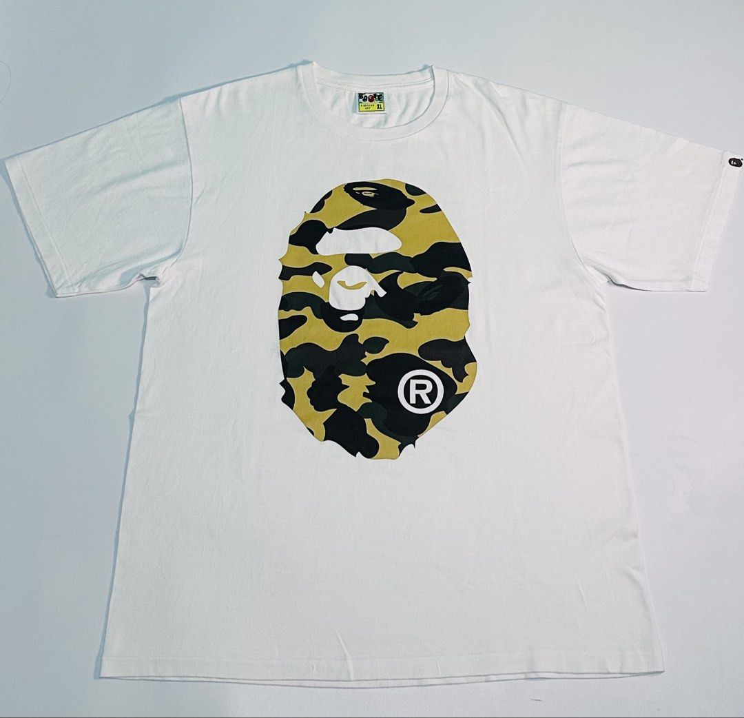 Bape Bighead 1st Camo Mirror Tee (Category: Announcements) located in Cagayan de Oro. Submitted by _thriftcultureph (Listing ID 1469713244, Image 1). Description: Bape Bighead 1st Camo Mirror Tee Guaranteed Authentic ( Money back If fake ) Size xl Excellent Condition No flaws.