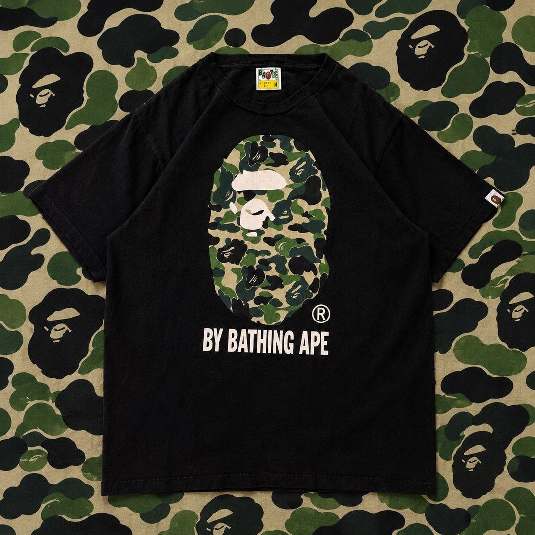 Bape head tee (Category: Formal Shirts) located in Bulacan. Submitted by b4mzz (Listing ID 1469639622, Image 1). Description: BAPE Camo Ape Head Tee 🦍 Classic black tee with iconic camo graphic. Perfect for streetwear fits. 📏 Width: 21.5” | Length: 28” 🎨 Color Rate: 8.5/10 ⚠️ Issue: Fading 💬 Open for reasonable offers!.