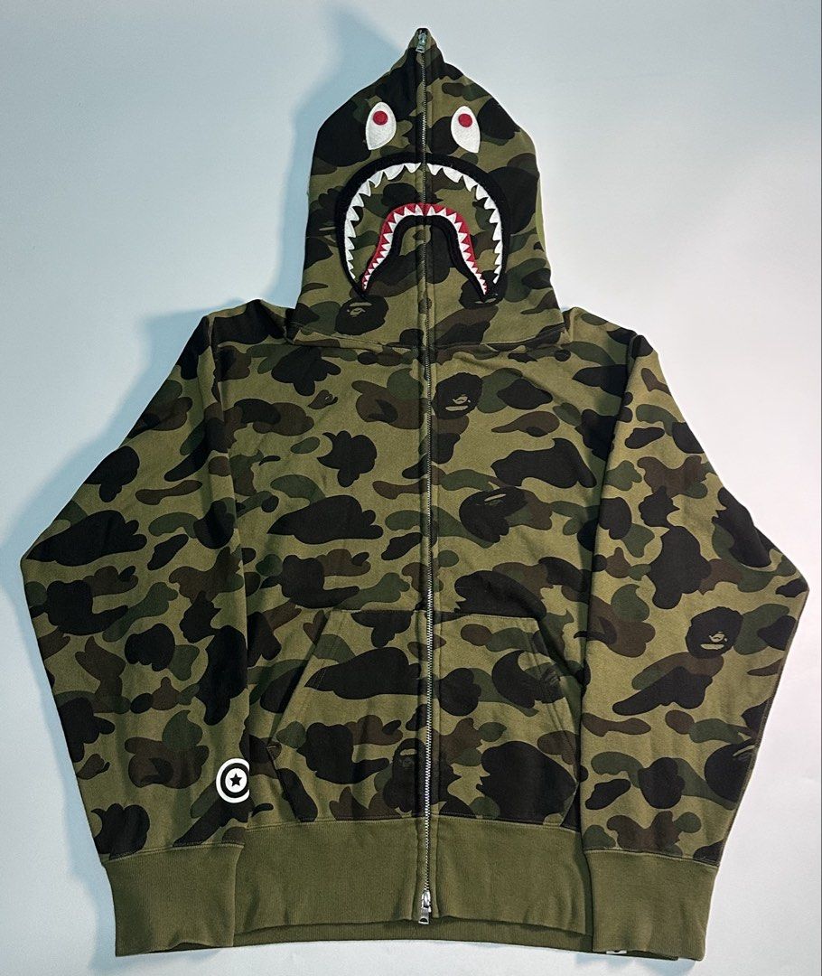 Bape Shark Green 1st Camo Jacket (Category: Announcements) located in Cagayan de Oro. Submitted by _thriftcultureph (Listing ID 1469715529, Image 1). Description: Bape Shark Green 1st Camo Jacket Guaranteed Authentic ( Money back if fake ) Size Medium Women ( Best fit Medium men ) Excellent Condition No flaws .