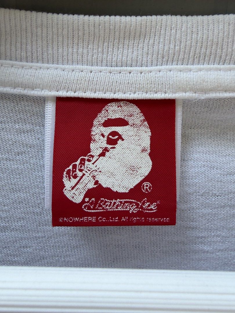 Bape x Coke (Category: Tshirts & Polo Shirts ) located in Manila. Submitted by tgr.archive (Listing ID 1469299430, Image 3). Description: Size: XL Condition: Excellent Color/fade rating: 9.8 Authentic FIT GUIDE Width: 22 Length: 29.