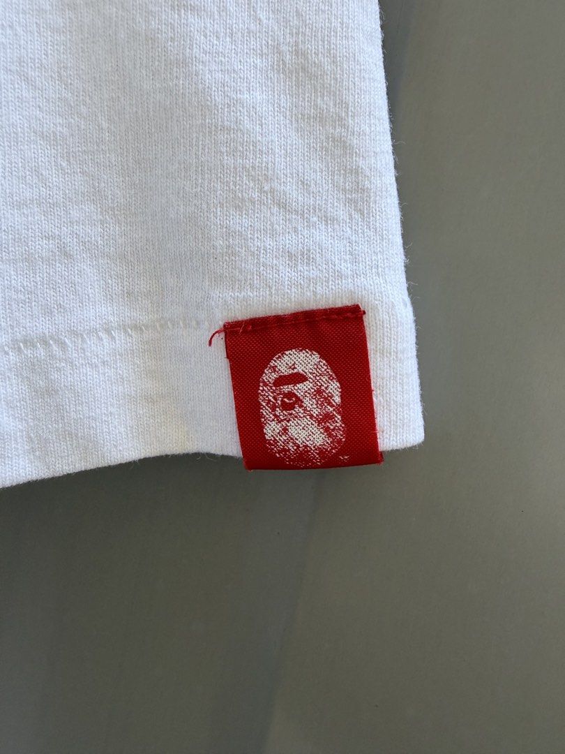 Bape x Coke (Category: Tshirts & Polo Shirts ) located in Manila. Submitted by tgr.archive (Listing ID 1469299430, Image 2). Description: Size: XL Condition: Excellent Color/fade rating: 9.8 Authentic FIT GUIDE Width: 22 Length: 29.