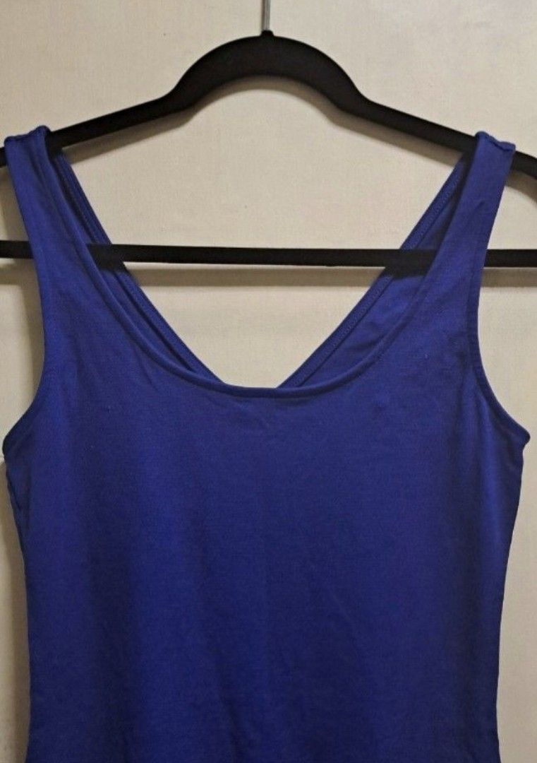 Bar III Royal Blue Dress (Category: Dresses) located in Manila. Submitted by thrifter_lifestyle (Listing ID 1469618310, Image 3). Description: Brand: Bar III (bought in the US) Sleeveless Round neck in front Racer back (see close up) Metal Zipper enclosure at back Material: as indicated in tag Color: Dark Royal Blue All relaxed measurement: Fabric is body hugging, fully stretchable 🙂 Waist: 26" Bust: 30" Length (shoulder to hem): 38.5" No issues