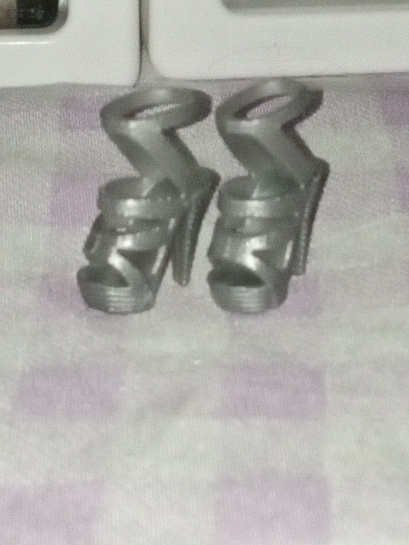 Barbie Silver high heel shoes strap sandals (Category: Heels) located in Dasmarinas. Submitted by jc_p4l3rm0 (Listing ID 1469733325, Image 1). Description: Pm for more inquiries & pictures.