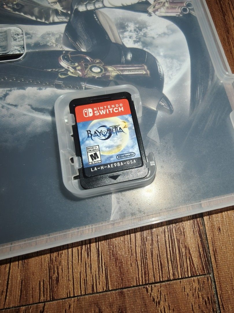 Bayonetta 2 Nintendo Switch Game (Category: Nintendo) located in Pasig City. Submitted by acnayb (Listing ID 1469753258, Image 2). Description: Includes the original case and game cartridge Does NOT include Bayonetta 1 for download Loc: Dela Paz, Pasig .