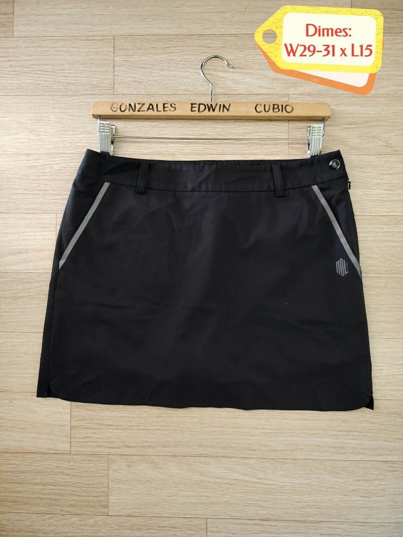 Beanpole Golf Skirt (W29-31 L15) (Category: Skirts) located in Nasipit. Submitted by edwingonzales498-69377 (Listing ID 1469578697, Image 2). Description: - Brand: Beanpole Golf - Color: Black - Size on tag: 73/98 (Fits waist 29-31 inches, Length 15 inches) - Built-in shorts underneath for comfort and mobility during swings - Functional pockets: Two front pockets with reflective piping, two back flap pockets, and a D-ring for tees or accessories 