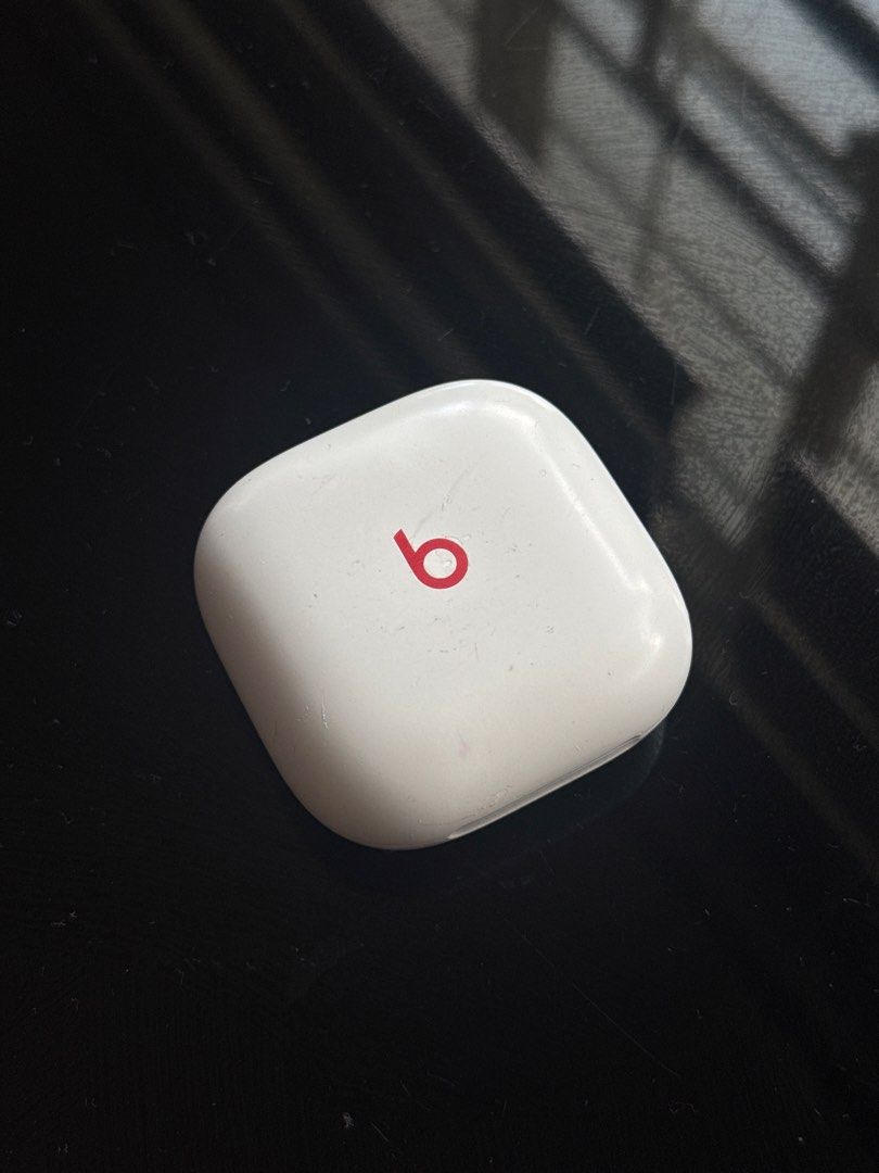 Beats Studio Buds White (Price Negotiable) (Category: Earphones) located in Quezon City. Submitted by ryanbuysandsells (Listing ID 1469629662, Image 1). Description: - Authentic replacement charging case for Beats wireless earbuds - Color: White with iconic red Beats logo - Condition: Fully functional and charges normally, with visible scuffs and scratches from everyday use - Note: Case only (earbuds are NOT included) - Ideal budget-friendly repl