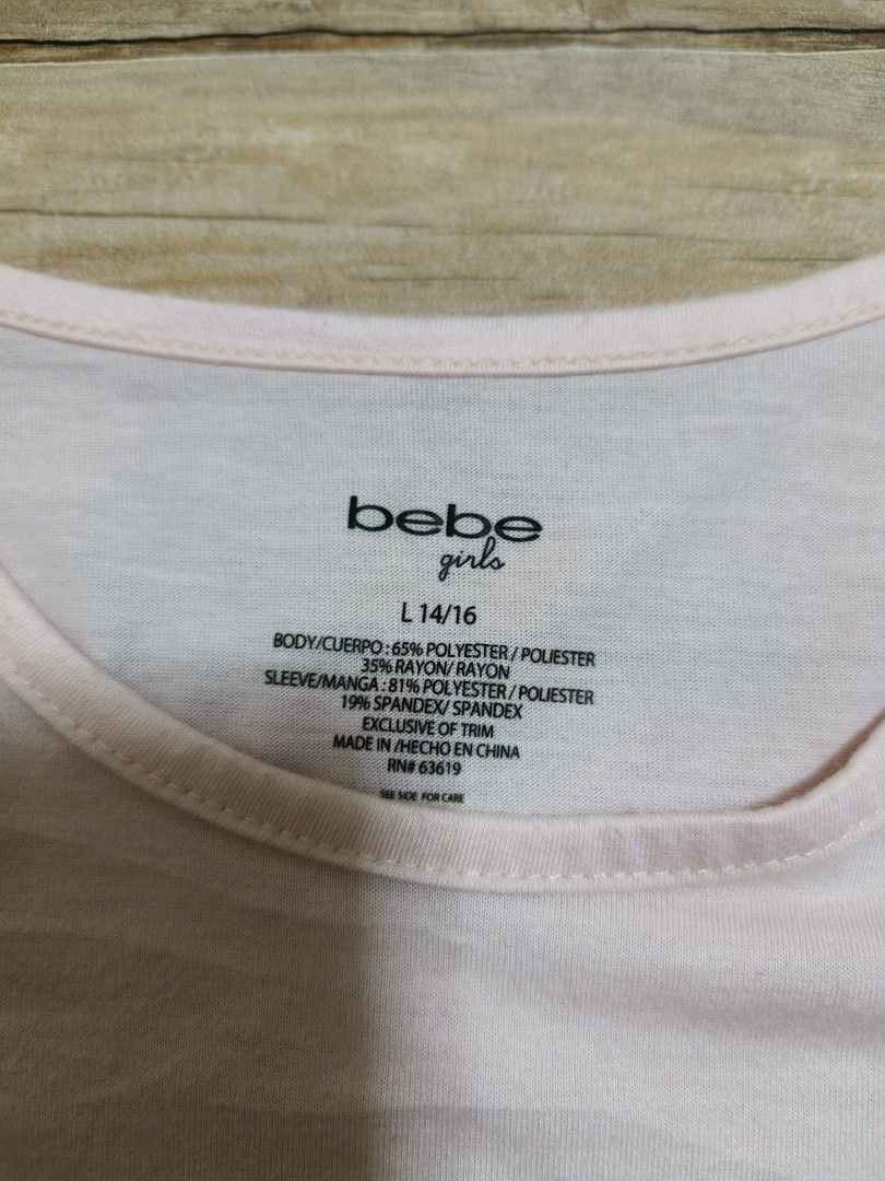 Bebe bling top (Category: Blouses) located in Siniloan. Submitted by talktotheroses (Listing ID 1469671542, Image 3). Description: no issue.