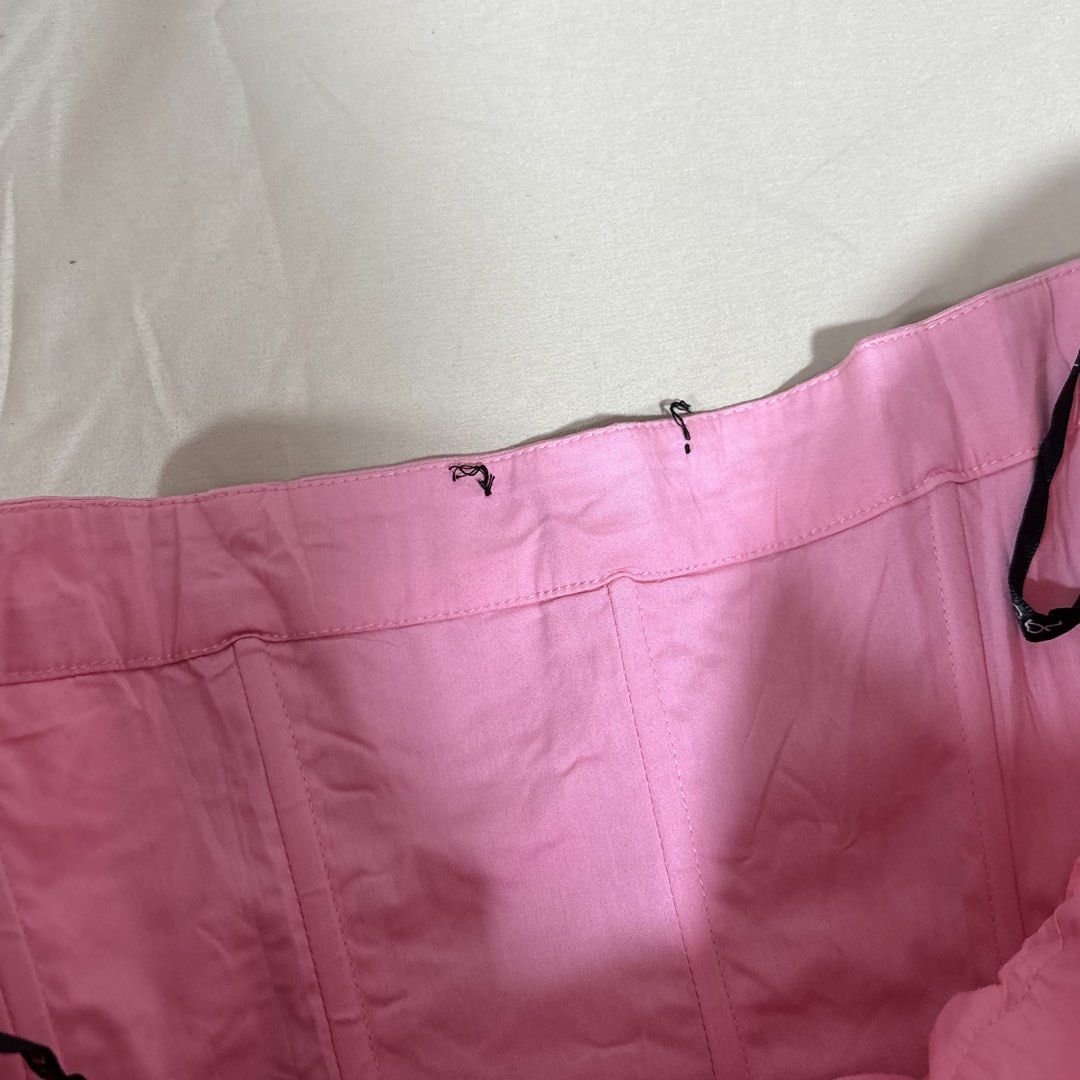 BEBE Peony Pink Ruched Corset Top Size L (Category: Sleeveless) located in Tuguegarao City. Submitted by shopaholiccccs (Listing ID 1469624802, Image 3). Description: - Brand: Bebe - Style: Corset top - Color: Peony Pink - Size: L - Material: Shell 1 (Cotton, Nylon, Spandex) & Shell 2 (Silk, Spandex) - Design: Sweetheart neckline with gathered ruching down the front - Details: Interior branded ribbon hanger straps - Origin: Made in China.