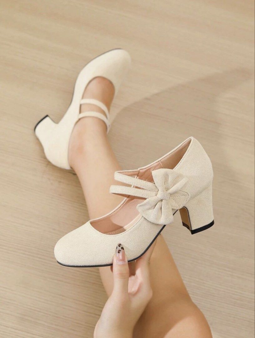 Beige Bow Mary Jane Chunky Heels (Category: Heels) located in Manila. Submitted by dayangxxi (Listing ID 1469695719, Image 2). Description: Beige chunky heels with double ankle straps and a cute side bow. Stable 6cm block heel makes walking super comfortable. Round toe style gives total vintage vibes. Neutral color goes with pretty much any outfit, from dresses to casual denim. Measurements and sizing details are all checked against the size guid