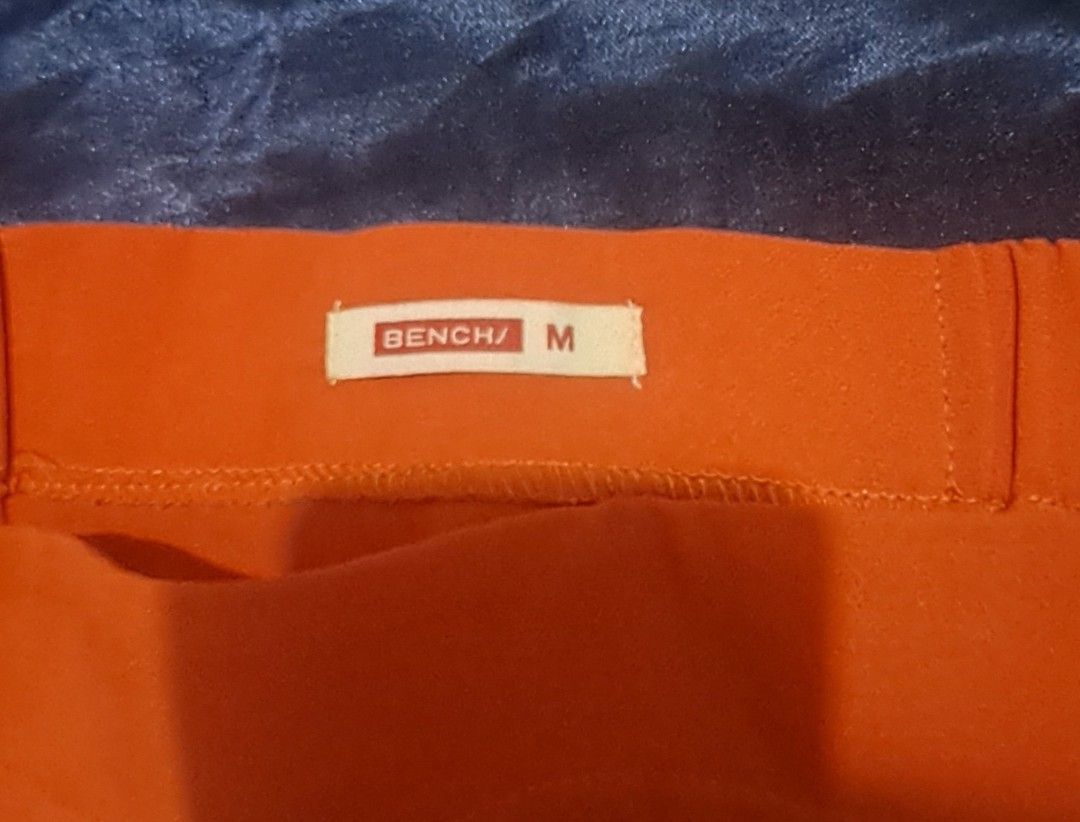 Bench Orange Off Shoulder Top Size M (Category: Blouses) located in Antipolo. Submitted by happyhoney26 (Listing ID 1469690557, Image 3). Description: - Brand: Bench - Size: Medium (tag attached) - Color: Bright orange - Style: Off-shoulder with short ruffled sleeves and elasticated neckline - Material: Soft fabric - Condition: Great for casual wear, summer days, and easily matched with denim.