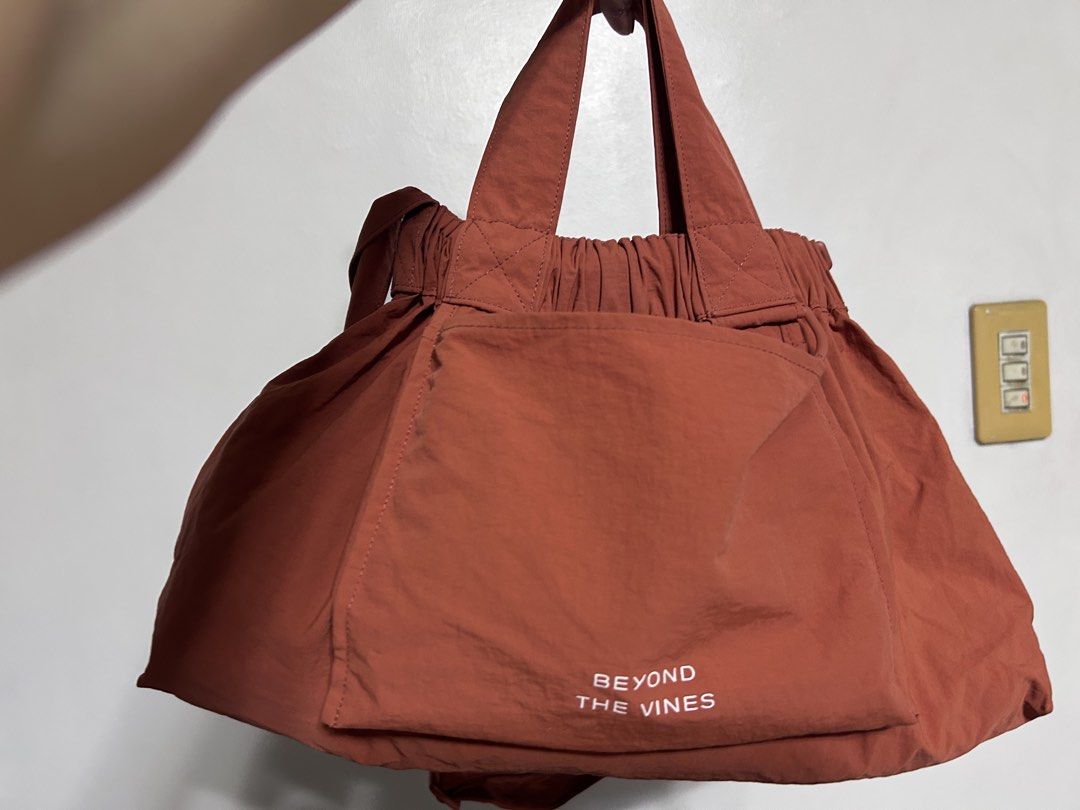 Beyond the Vine - Dumpling bag dual purposes (Category: Cross-body Bags) located in Quezon City. Submitted by lunamond (Listing ID 1469697998, Image 2). Description: Dual purpose bag , with hand-held and croo body strap. Tangerine in color functional wise is very good to manage.